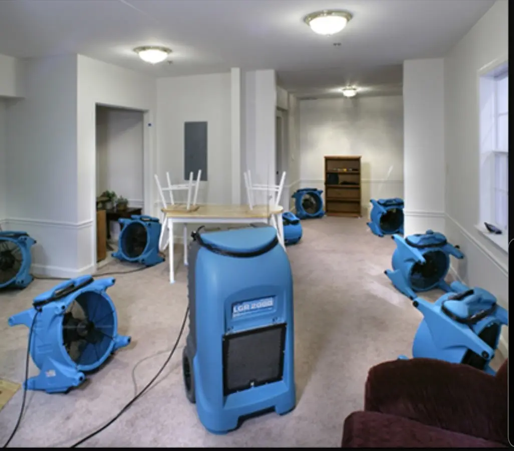 Air movers and dehumidifier setup for Water Damage Restoration in Monmouth